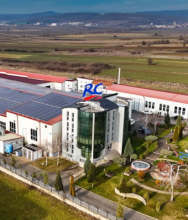Aerial view of Royal Beverage’s factory facility with visible branding and landscaped surroundings