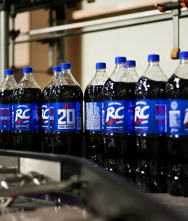 Another view of RC Cola bottles in production on a mechanical line